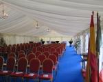 Arranged chairs marquee int.